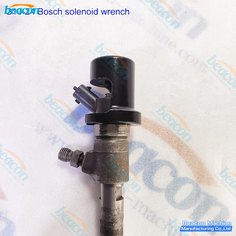 G10-24 common rail injector solenoid wrench mounted on a Bosch CRIN injector unit.