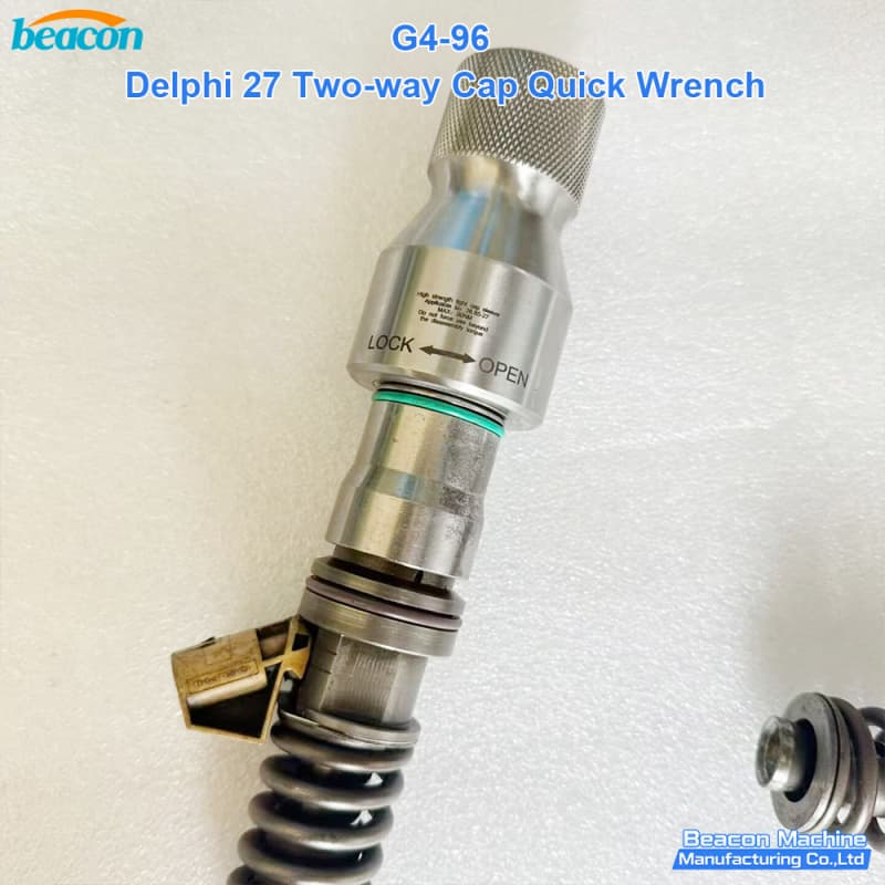 G4-96 quick wrench mounted on a Delphi injector showing the "LOCK" and "OPEN" directional guides.