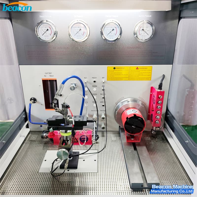 Precision internal chamber of diesel test bench featuring analog pressure gauges and high-pressure fuel lines.