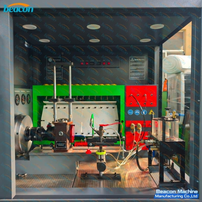 Panoramic view of the interior test chamber with cambox fixture, common rail clamp, and HEUI measurement module.